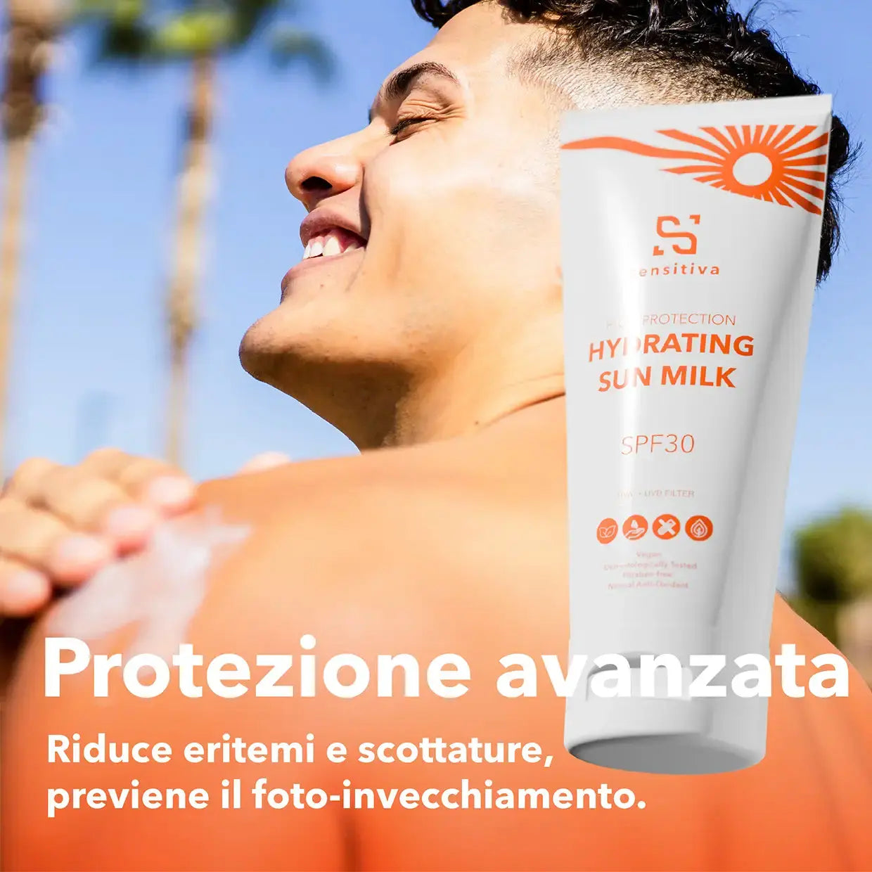 immagine di un ragazzo che spalma la crema solare sensitiva sulla spalla