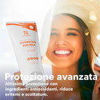 immagine di una ragazza con cappello  che sorride al mare con una confezione di crema solare sensitiva